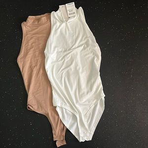 Two brand new bodysuit tank tops